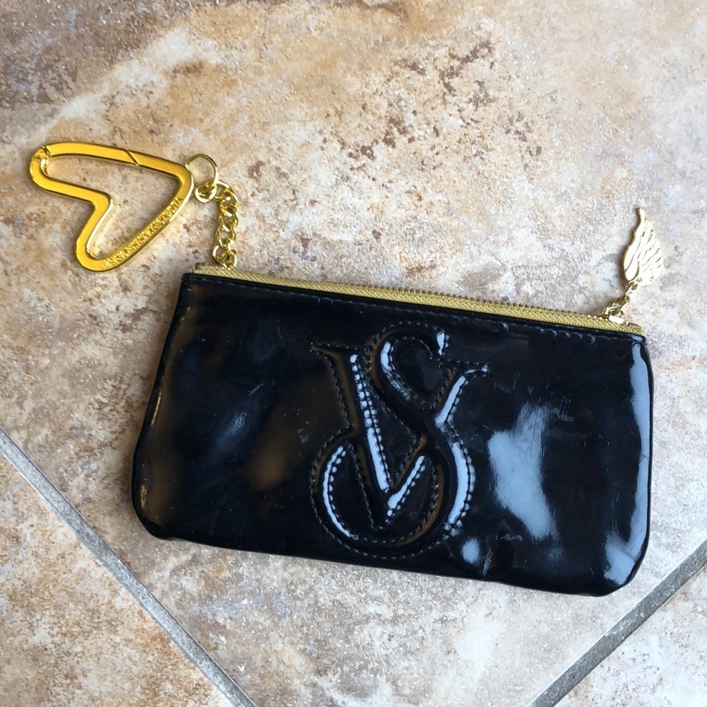 *FREE with purchase*
Small blAck and gold VS pouch/wallet